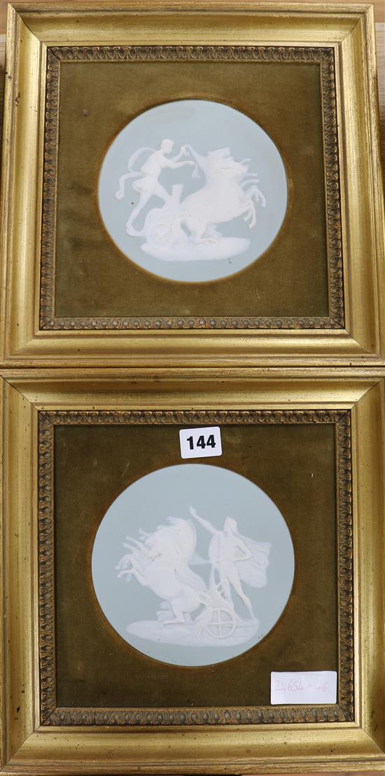 Two Wedgwood style framed wall plaques Diameter approx. 15.5cm